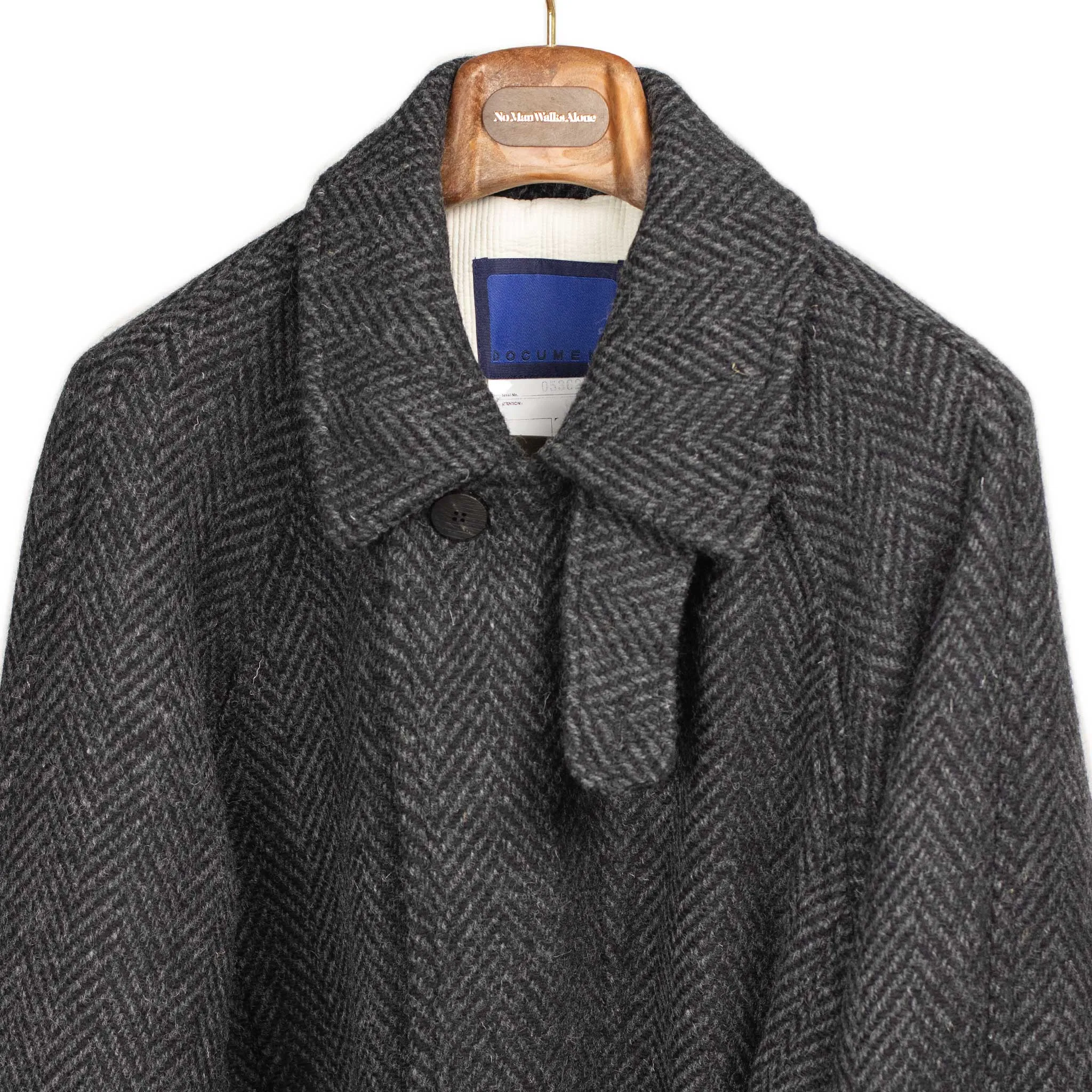 Belted balmacaan in grey herringbone wool donegal tweed