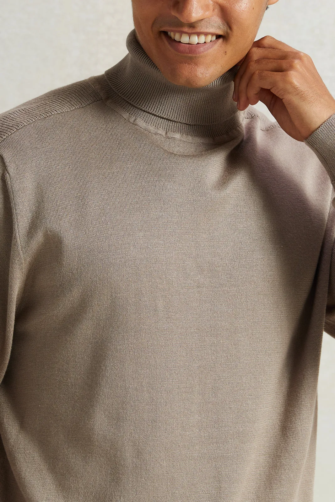 Men Beige Solid High-Neck Pullover